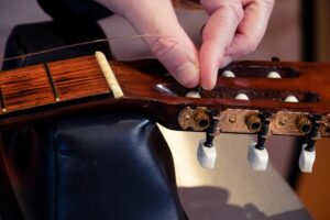 Restring a classical guitar