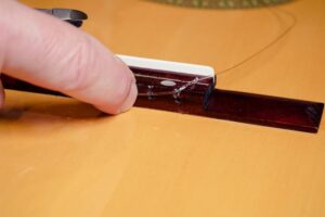Restring a classical guitar