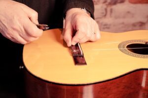 Restring a classical guitar High Wycombe