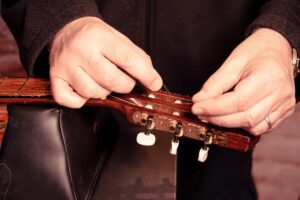 Restring a classical guitar High Wycombe