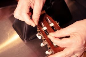 Restring a classical guitar High Wycombe