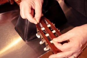 Restring a classical guitar High Wycombe