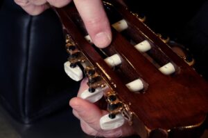 Restring a classical guitar High Wycombe