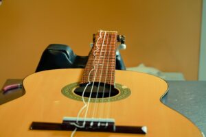 Restring a classical guitar High Wycombe