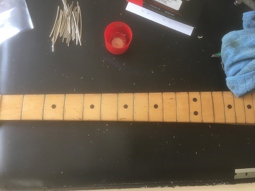 Fender guitar neck with frets removed