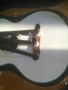 Bridge doctor repairs for guitar bellying high wycombe
